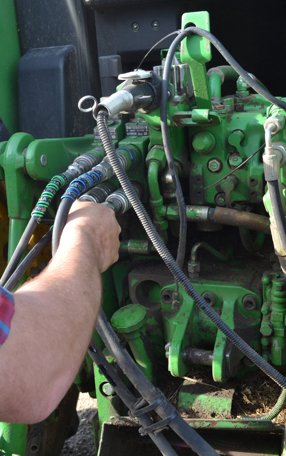 Using Outback Wrap on hay baler's hydraulic hoses