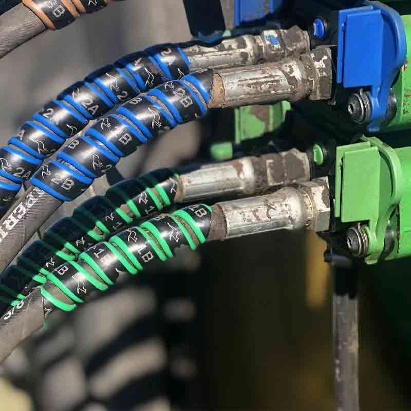 Outback Wrap hydraulic hose markers. 2 Pairs. Green & Blue shown on actual tractor.